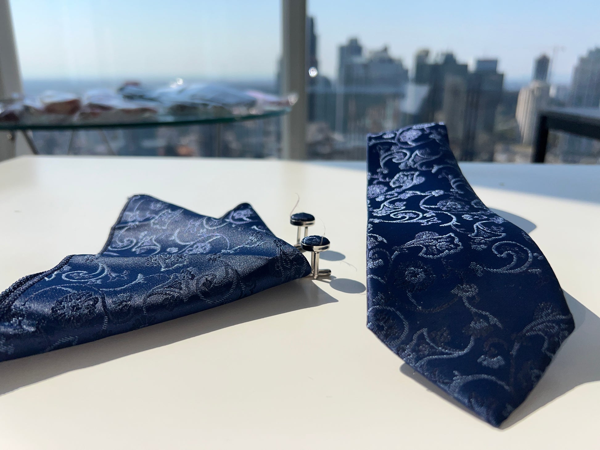 Complete navy blue paisley tie set arranged neatly, ideal for gift giving and special occasions